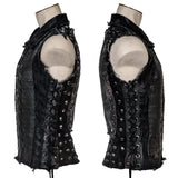 Wornstar Clothing men's custom vest. Handmade custom denim and leather rock vest. Rocker style black stretch denim custom-made stage vest.