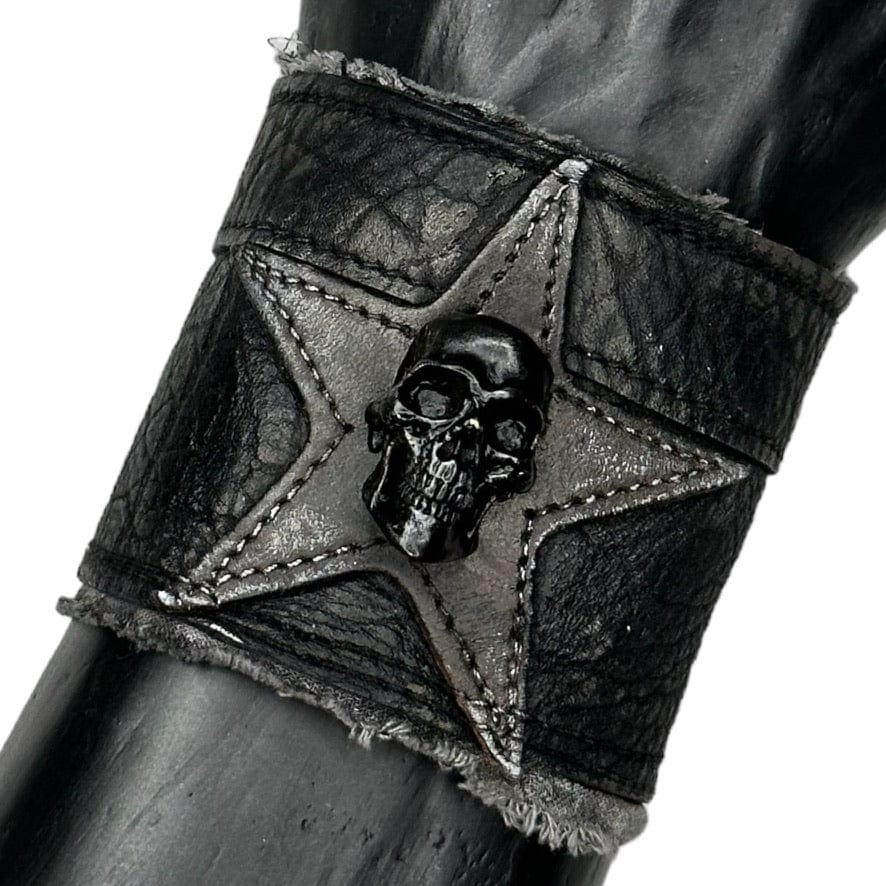 • Wornstar Custom Stage Wear Collection• Ready to ship - Custom leather wrist band• One of a kind• Designed, made, and sold exclusively by Wornstar Clothing• Completely hand-made• Individually made; each one will vary slightly• Made with soft leather• Metal skull accent• Lined for comfort• Hand-distressed• 