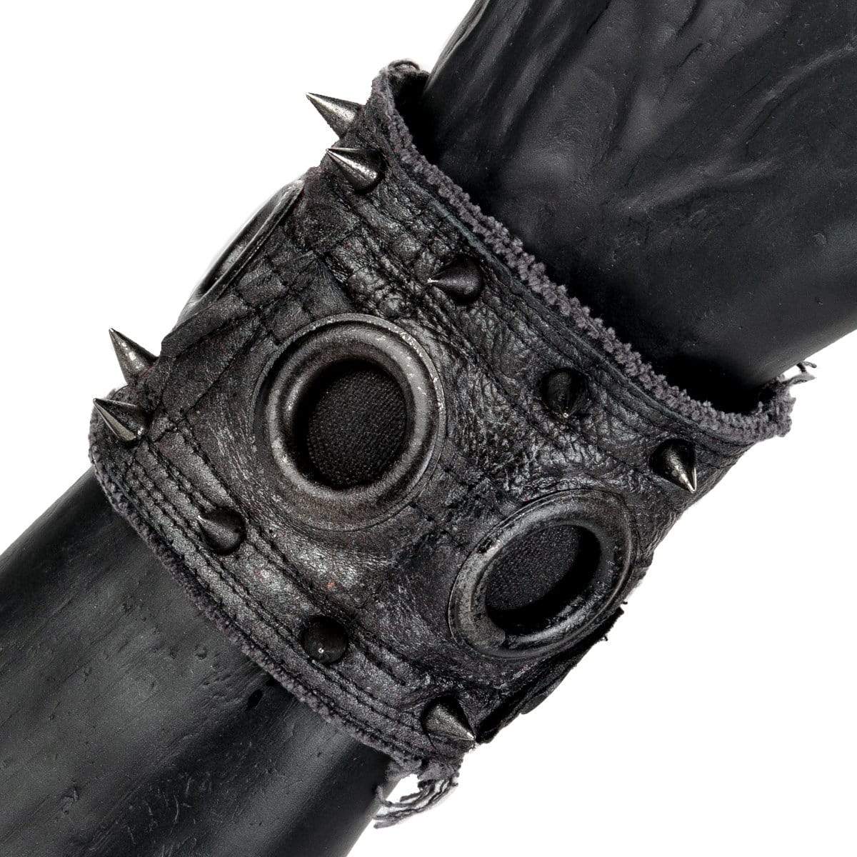 • Wornstar Custom Stage Wear Collection• Custom leather wrist band• Completely hand-made at time of order • Designed, made, and sold exclusively by Wornstar Clothing• Individually made; each one will vary slightly• Made with soft leather• Lined with fabric for comfort• Hand-studded detail with small cone spikes•