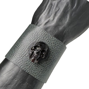 • Wornstar Custom Stage Wear Collection• Custom leather wrist band• Ready to Ship. • Designed, made, and sold exclusively by Wornstar Clothing• Individually made; each one will vary slightly• Made with soft, thick, leather• Drab, dark, olive green color• Hand-set black, distressed, metal skull• Hand-distressed• 