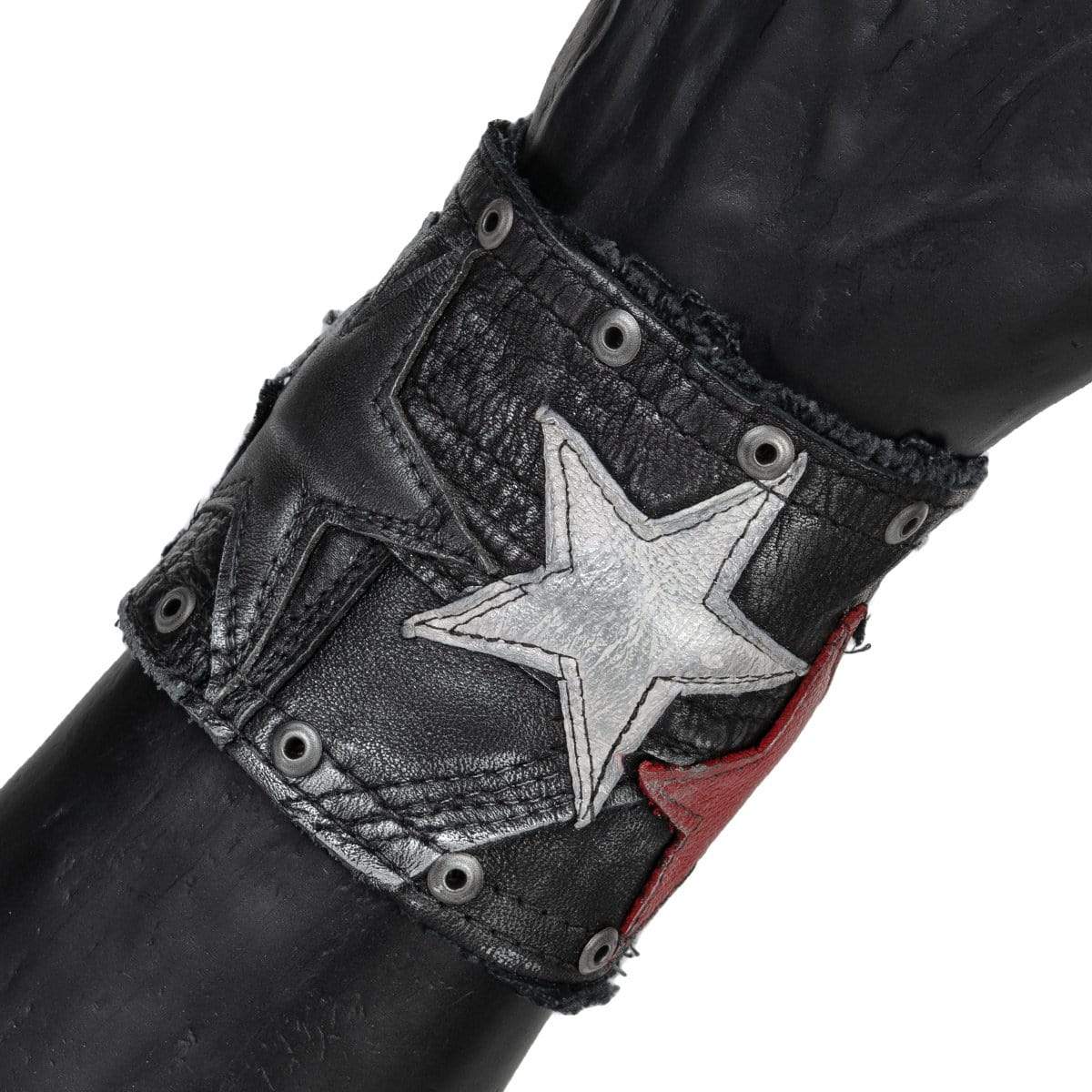 • Wornstar Custom Stage Wear Collection• Custom leather wrist band• Completely hand-made • Designed, made, and sold exclusively by Wornstar Clothing• Individually made; each one will vary slightly• Made with soft leather• Lined with fabric for comfort• Hand-studded detail• Hand-painted• Hand-distressed•