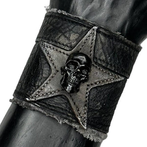 • Wornstar Custom Stage Wear Collection• Made at time of order. Custom leather wrist band• Designed, made, and sold exclusively by Wornstar Clothing• Completely hand-made• Individually made; each one will vary slightly• Made with soft leather• Metal skull accent• Lined for comfort• Hand-distressed• Hand-painted•