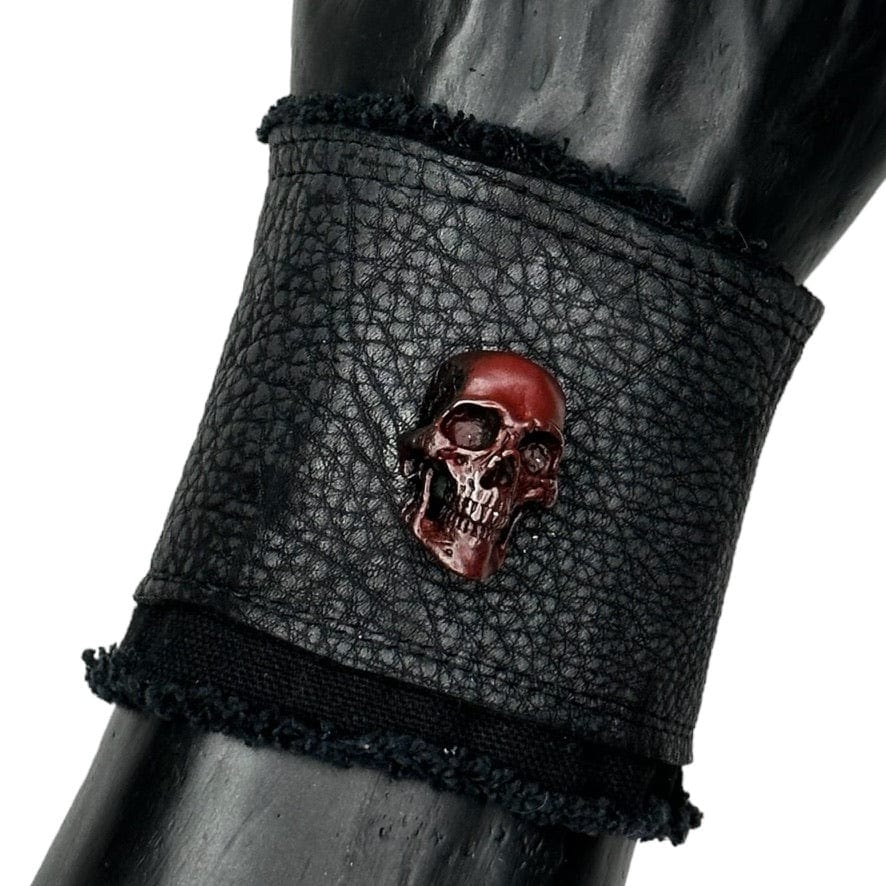 • Wornstar Custom Salvaged Collection• Ready to ship - Custom leather wrist band• One of a kind• Designed, made, and sold exclusively by Wornstar Clothing• Completely hand-made• Individually made; each one will vary slightly• Made with soft leather• Metal skull accent• Lined for comfort• Hand-distressed• Hand-printed• 