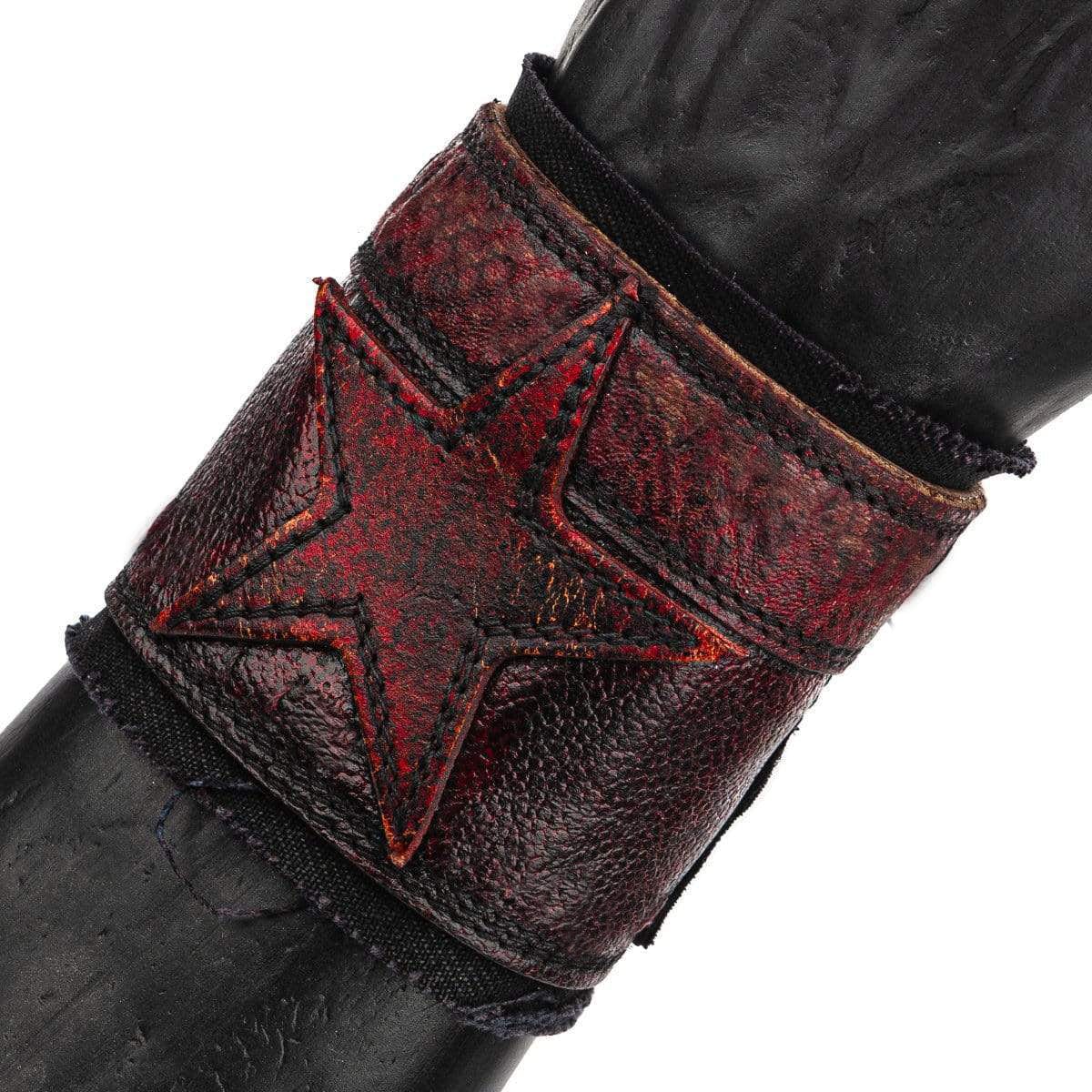 • Wornstar Custom Salvaged Collection• Custom leather wrist band• Completely hand-made at the time of order• Designed, made, and sold exclusively by Wornstar Clothing• Each one will vary slightly • Made with soft leather• Lined with fabric for comfort• Hand-stitched detail• Hand-painted• Hand-distressed• 